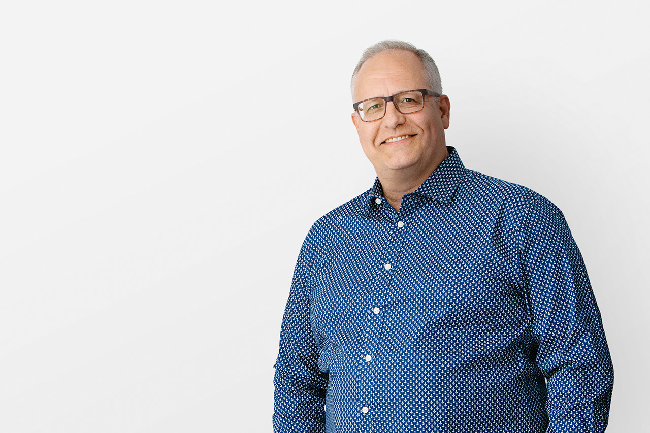 Portrait of Henriquez team member, Christian Schimert, Associate.